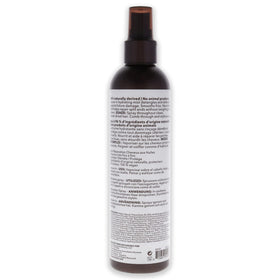 Macadamia Professional mist being sprayed on damp hair for lightweight detangling