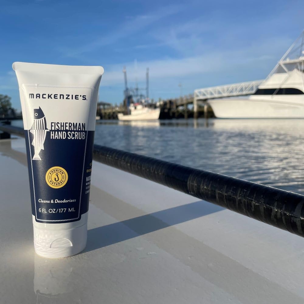 MacKenzie's scrub being used on a boat dock to remove fish odor effectively
