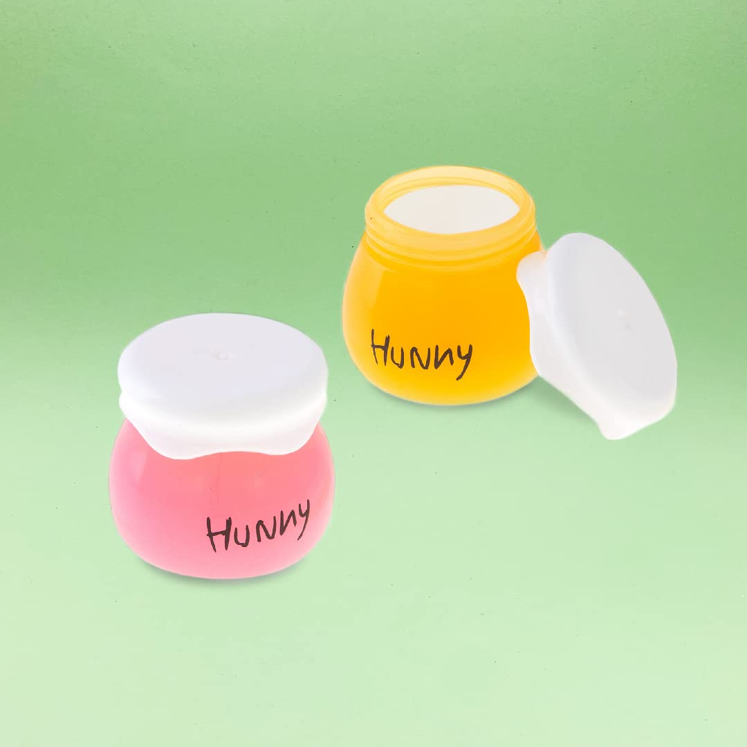 MAD Beauty tins staged near a handbag showing lifestyle portability and gifting