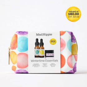 Mad Hippie travel-size kit held in hand showing compact scale benefit