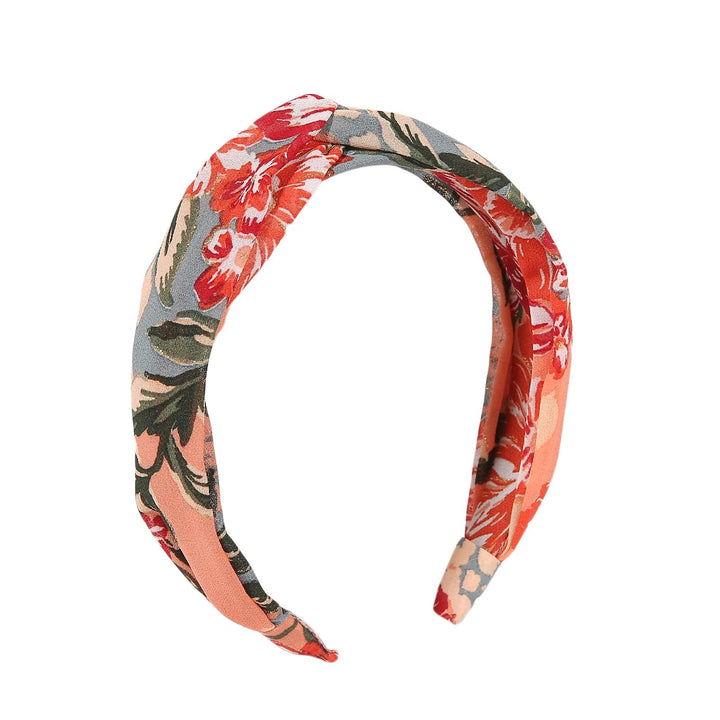 Madison Tyler headband front view showing floral print and rhinestones for stylish hold