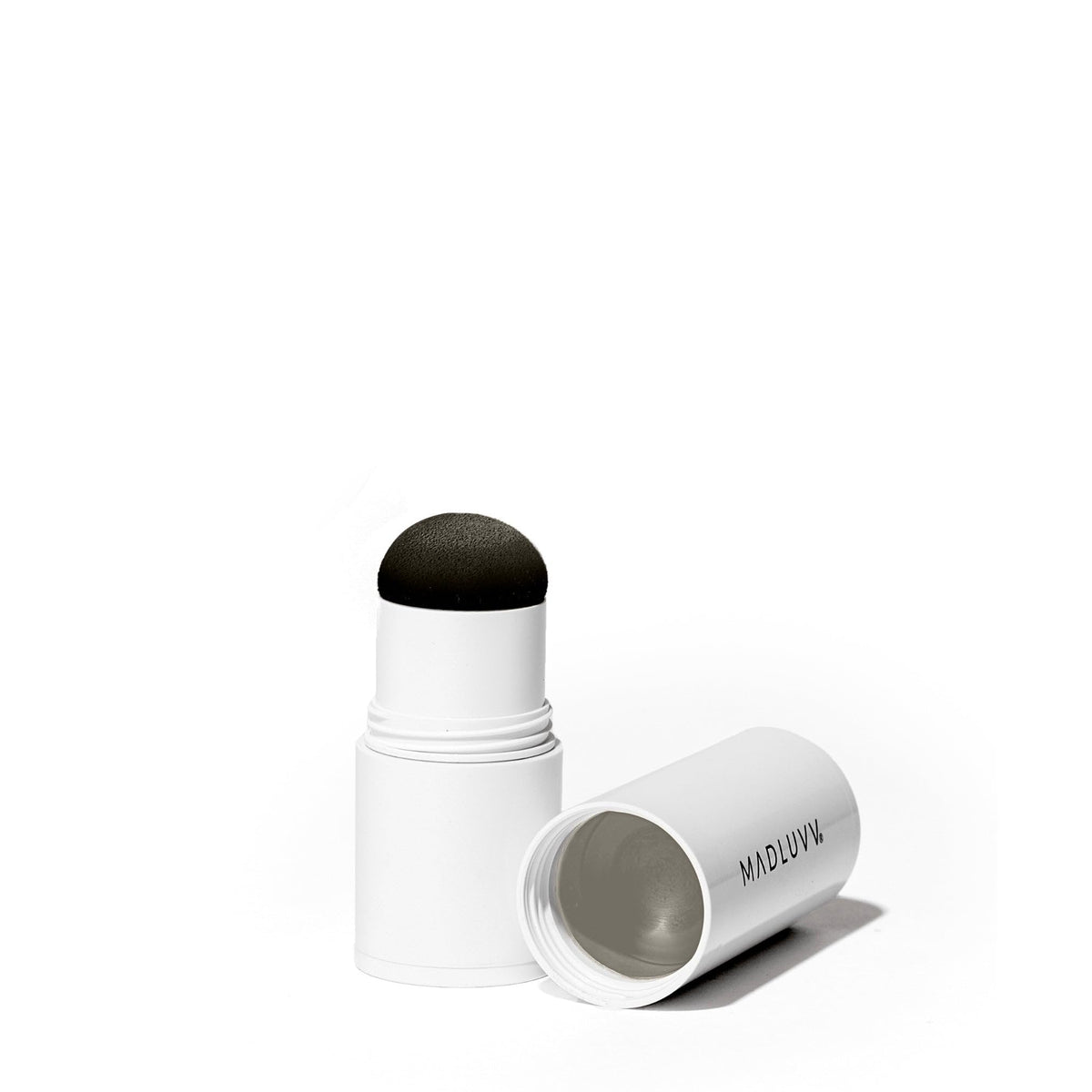 MADLUVV refill in hand demonstrating compact scale and easy portability