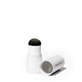 MADLUVV refill in hand demonstrating compact scale and easy portability