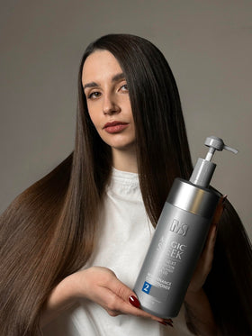 MagicSleek applied in hands demonstrating easy distribution and detangling benefit