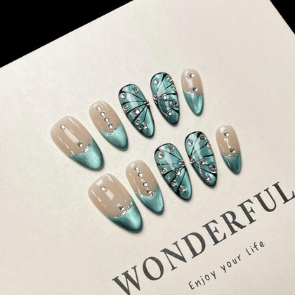 MAGLFELL front packaging showing blue almond press-on nails and complete kit benefits