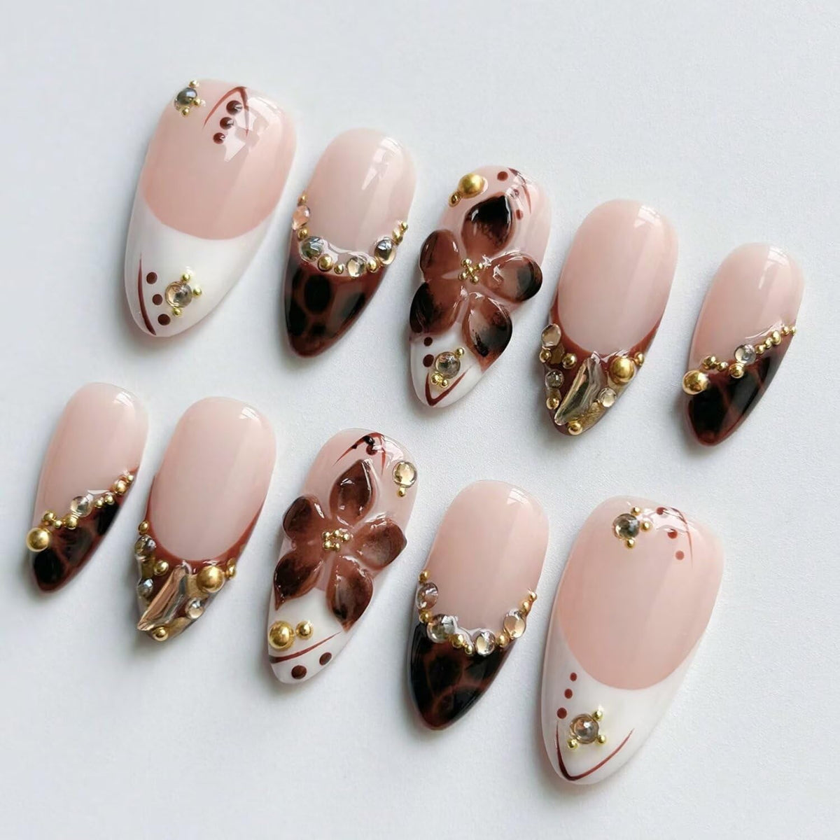 MAGLFELL front view of brown almond press-on nails showing complete set and packaging benefit