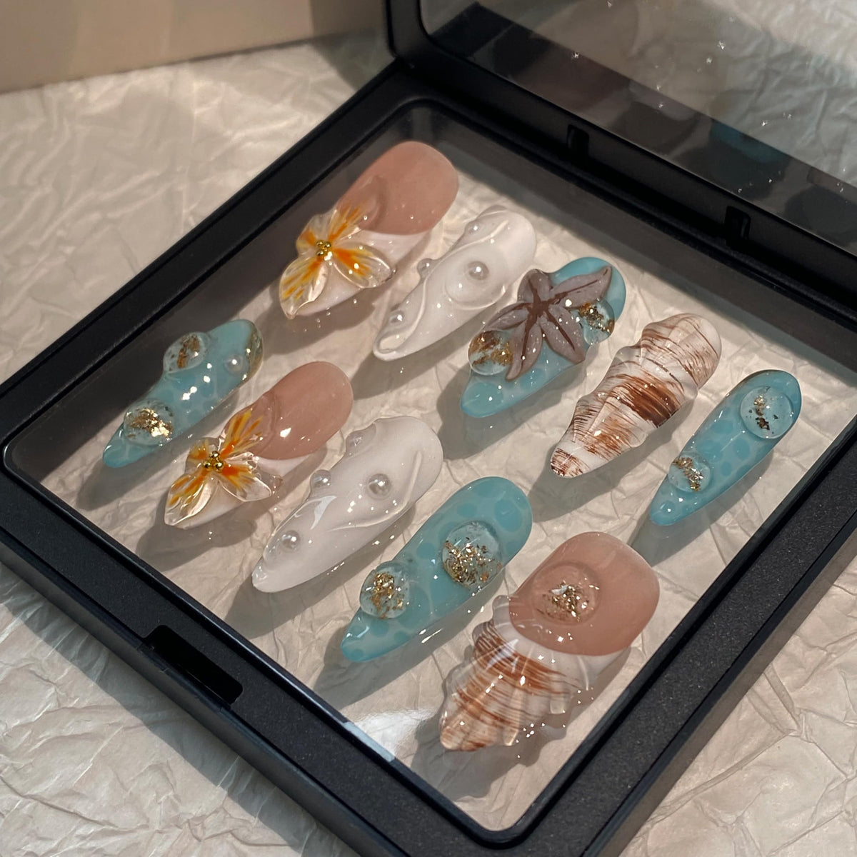 MAGLFELL front packaging showing 10-piece set and included tools for easy application