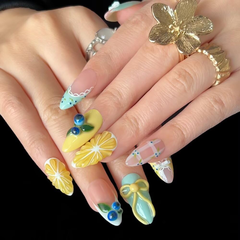MAGLFELL nails worn on hand in lifestyle shot demonstrating stylish almond French shape