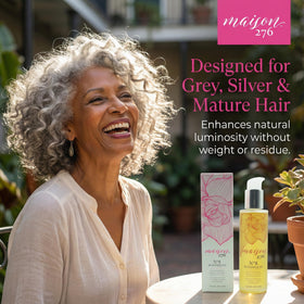 Maison 276 applying oil to hair ends for smoother, shinier tips