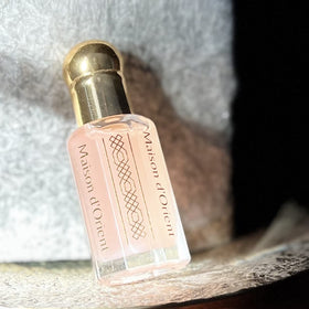 Maison d'Orient label detail, showing authentic Arabian perfume oil benefit