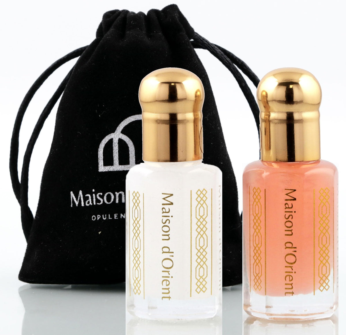Maison d'Orient pink musk bottles displayed, showing compact travel-ready benefit
