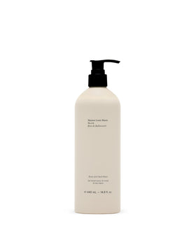 Maison Louis Marie bottle front view showing elegant packaging and luxury benefit