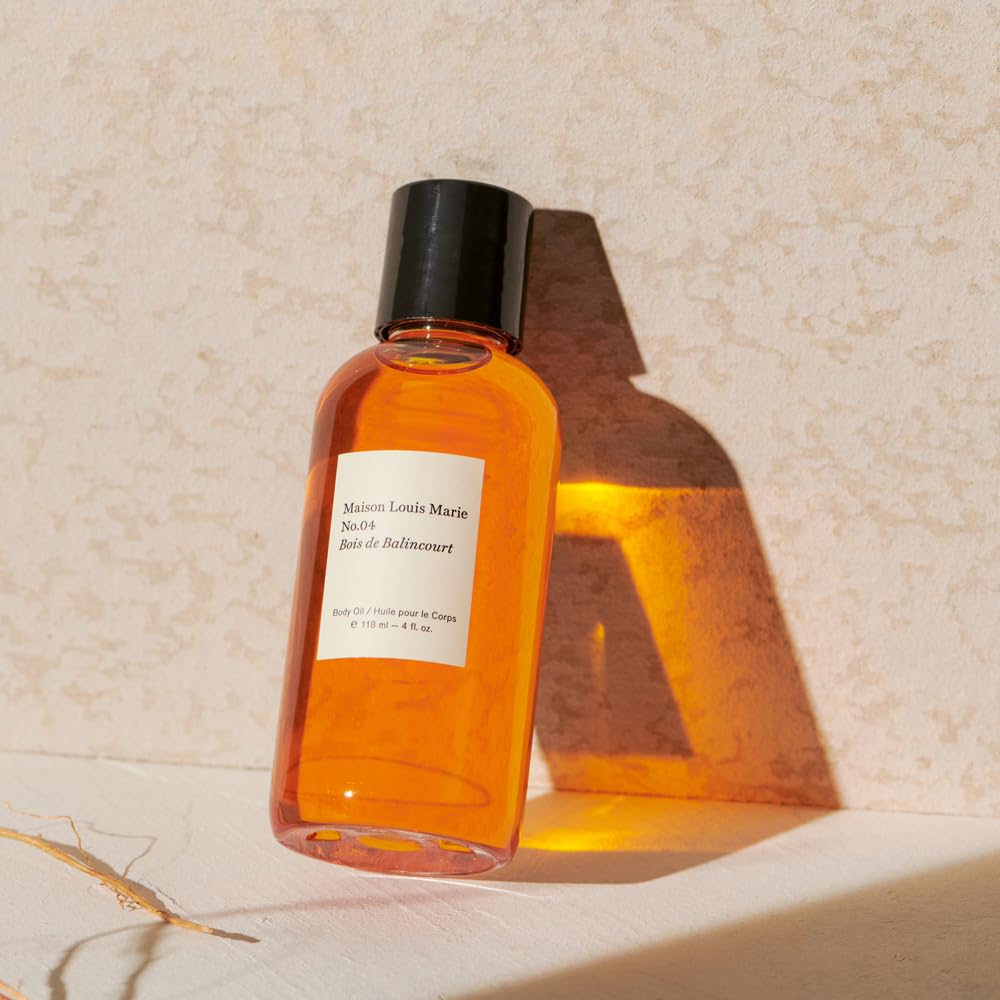 Maison Louis Marie bottle staged in bathroom setting suggesting luxury ritual benefit