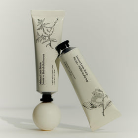 Maison Louis Marie tube beside ruler to show 50 ml size, ideal for travel