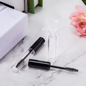 Maitys funnel pouring castor oil into tube demonstrating spill-free refilling benefit