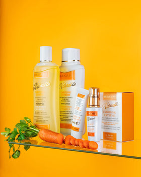 MAKARI bottle beside plants showcasing natural botanical formula