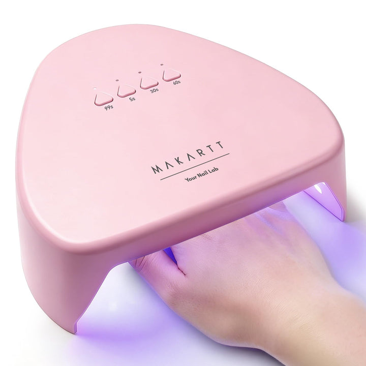 Makartt front view of compact lamp showing sleek pink finish and user-friendly design