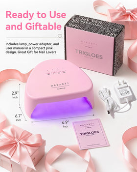 Makartt lamp styled on vanity to show pink finish as a fashionable gift option