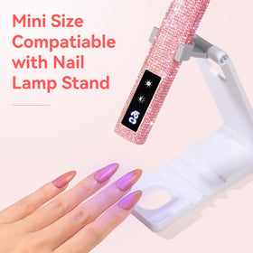 Makartt lamp pictured with polish bottles for salon-ready styling benefit