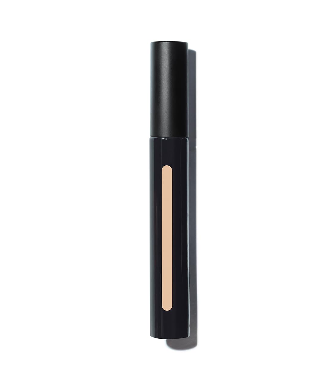 MAKE concealer held in hand to show product size and travel-friendly benefit