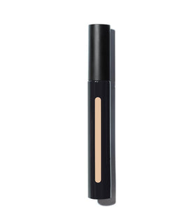 MAKE concealer held in hand to show product size and travel-friendly benefit
