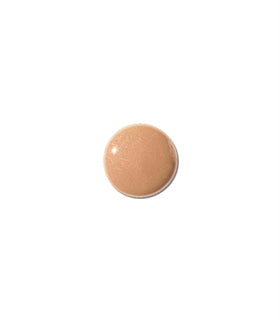 MAKE texture close-up showing smooth, dewy tint for even skin