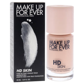 Make Up For Ever swatch on skin with brush, demonstrating buildable coverage and true tone