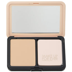 Make Up For Ever powder being applied with brush, smooth coverage benefit