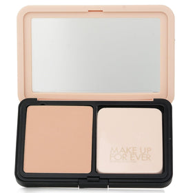 Make Up For Ever model wearing powder for matte skin look, camera-ready benefit