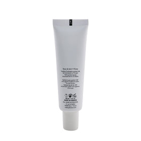 Make Up For Ever primer applied on model illustrating smoother foundation application