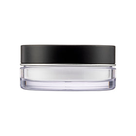 Make Up For Ever powder being applied with a fluffy brush for long-lasting mattifying benefit