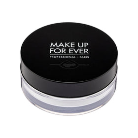 Make Up For Ever powder held in hand to show size and travel-friendly convenience