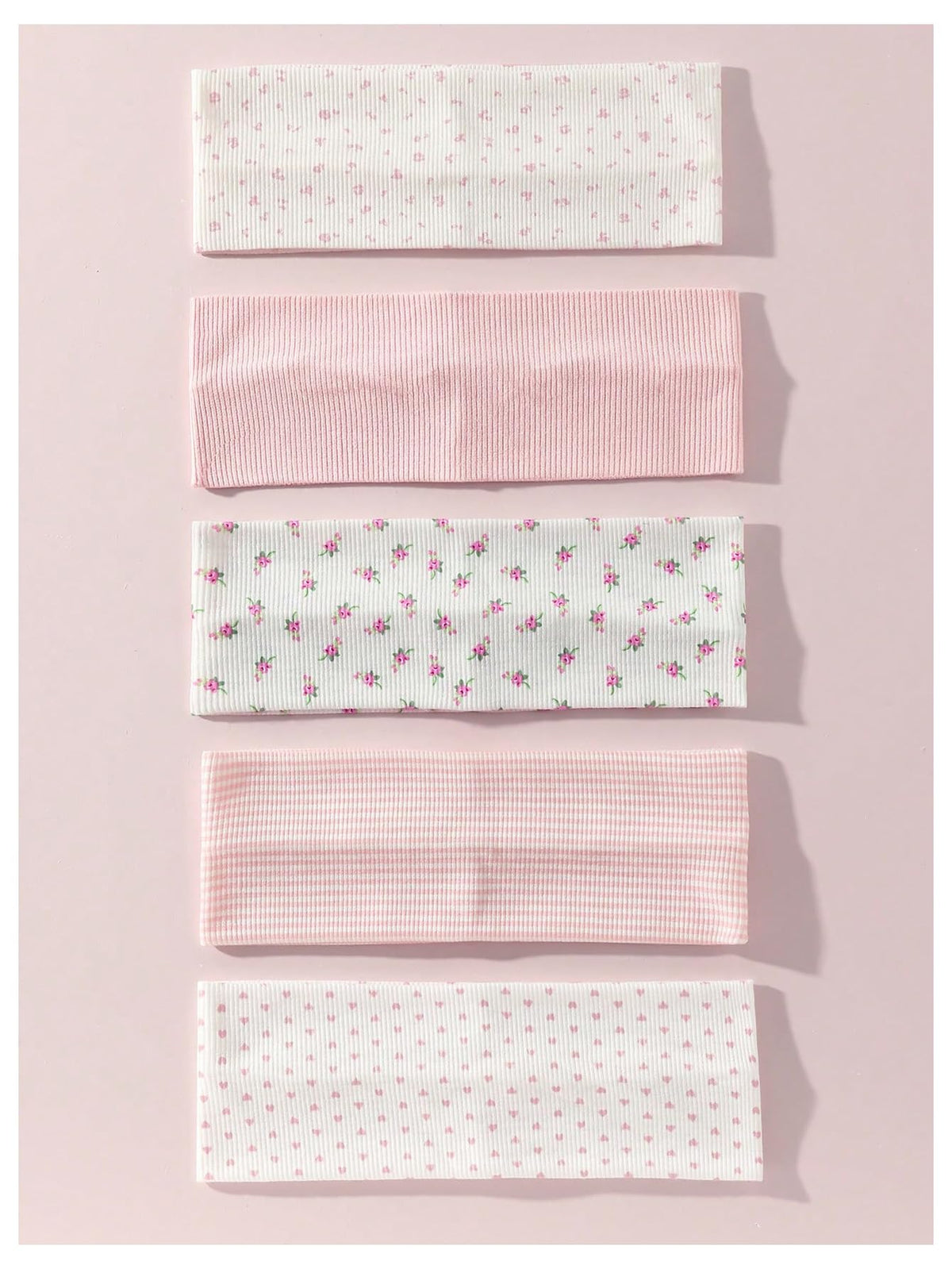 MakeMeChic headband on hand showing one-size stretch and length