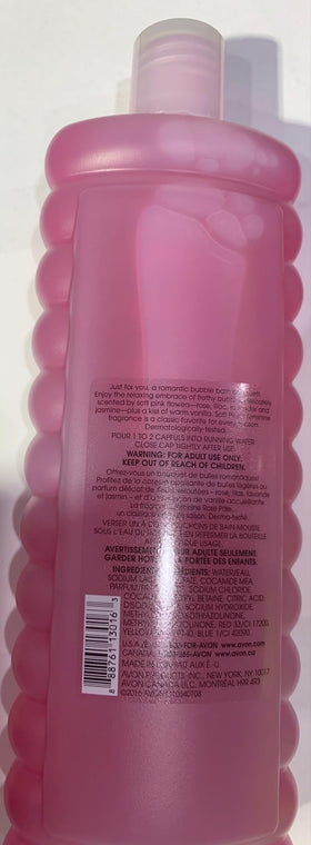 MAKJUNS Avon bottle beside bubbly bathtub showing indulgent foam benefit