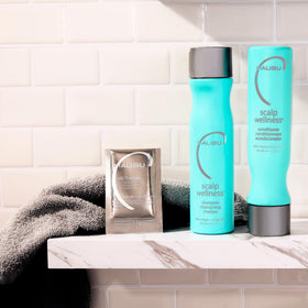 Malibu C applied to wet hair demonstrating cooling spearmint effect