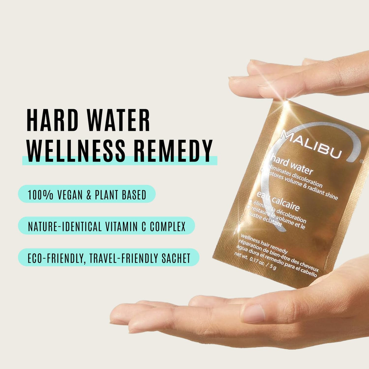 Malibu C being applied to wet hair demonstrating mineral removal benefit