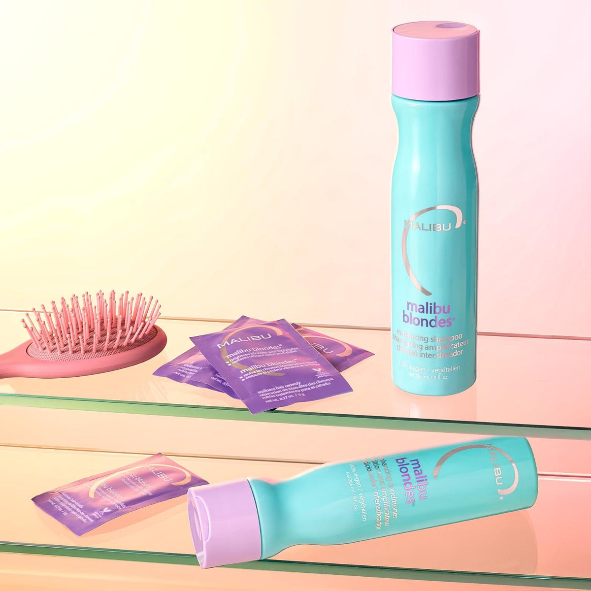 Malibu C conditioner being applied to mid-lengths to reduce tangles
