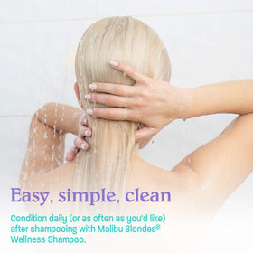 Malibu C product label close-up displaying vegan and sulfate-free benefits