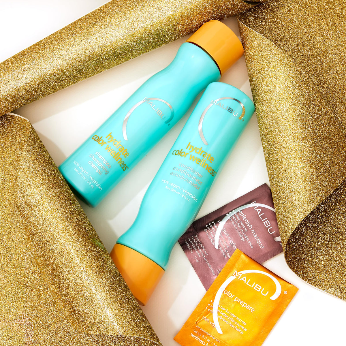 Malibu C bottle beside eco-badge showing vegan, sulfate-free, cruelty-free benefits