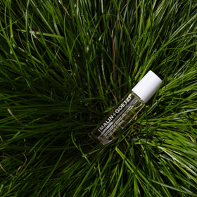 MALIN+GOETZ ingredients display with cedarwood patchouli bergamot for scent profile