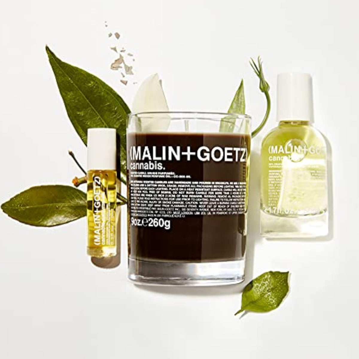 MALIN+GOETZ perfume oil inside purse highlighting portability and on-the-go refresh