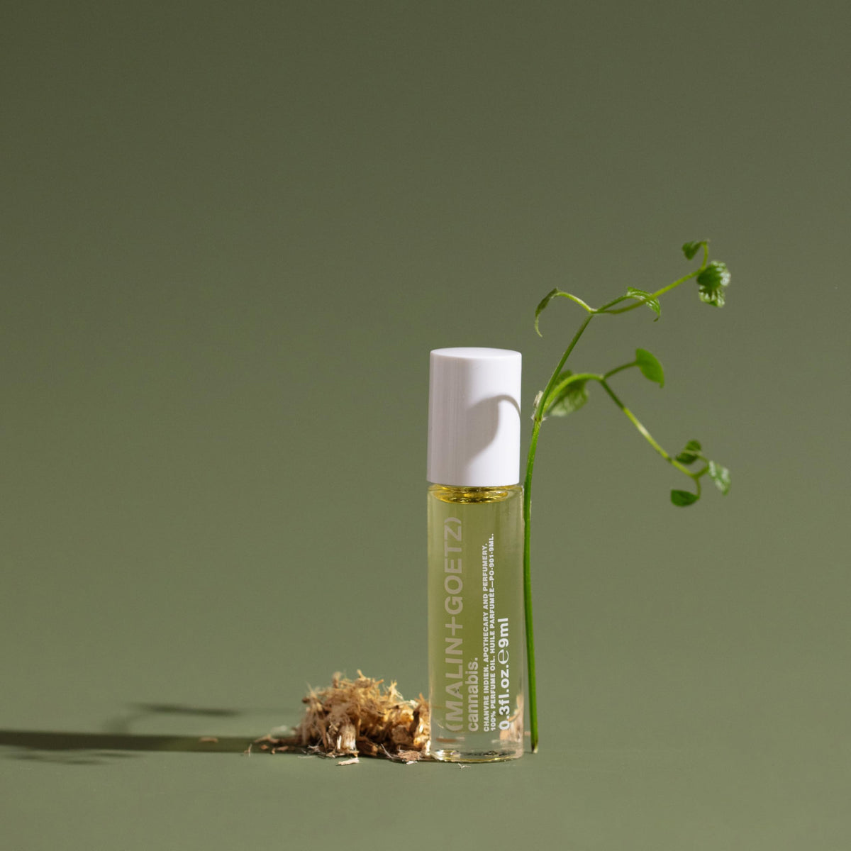 MALIN+GOETZ oil texture on skin demonstrating concentrated, long-lasting scent