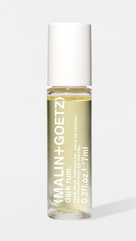 MALIN+GOETZ close-up of Dark Rum label highlighting scent name and ingredients