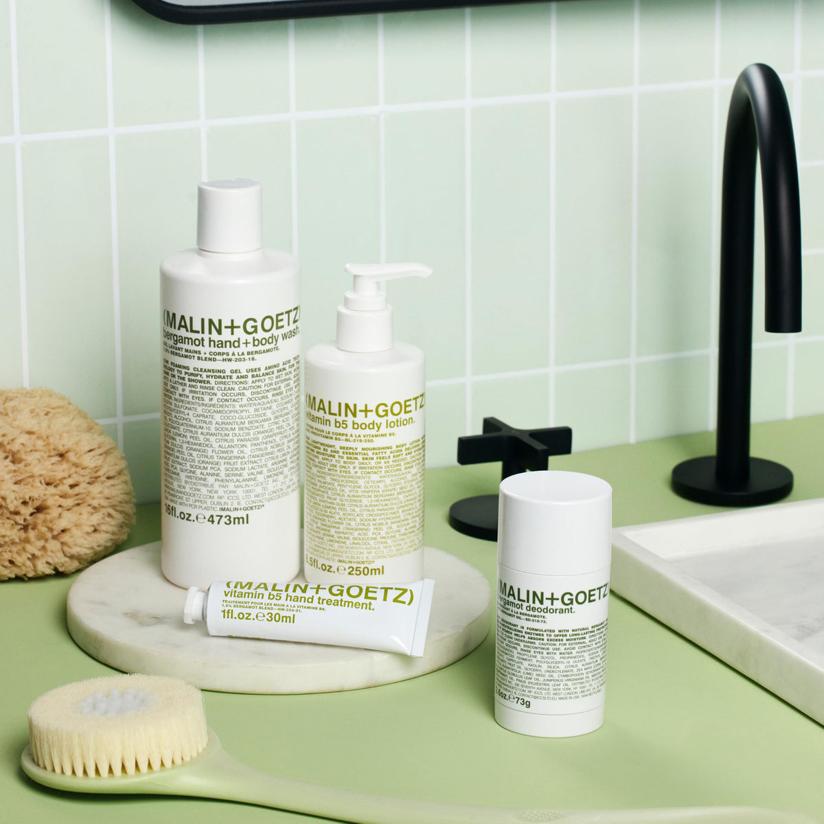 MALIN+GOETZ label close-up displaying clean ingredients for peace of mind