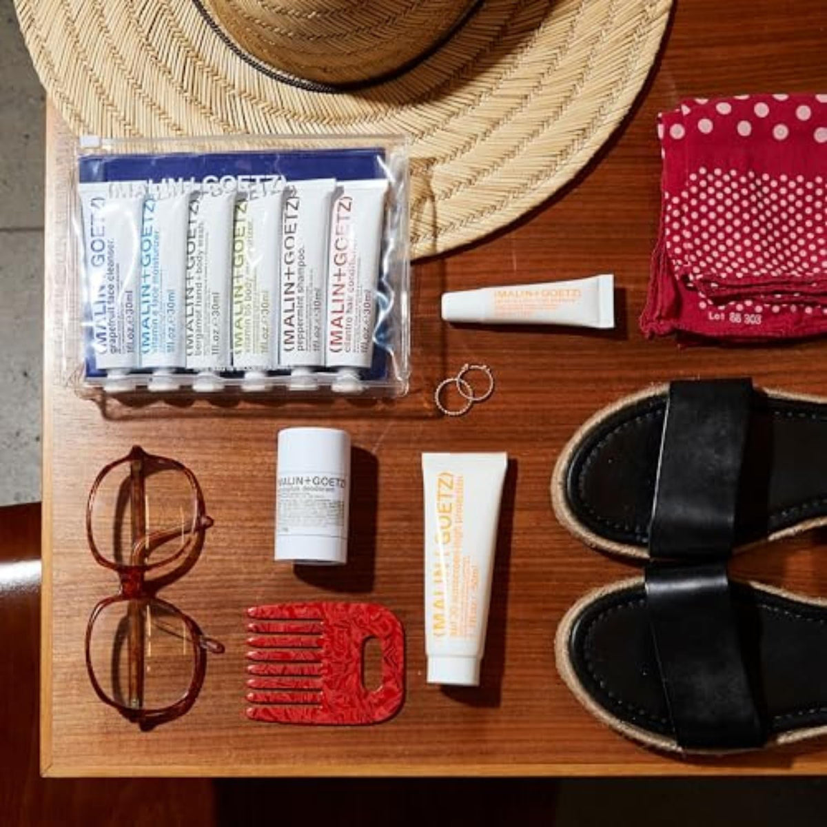 MALIN+GOETZ applied to face in outdoor setting showing everyday broad spectrum coverage