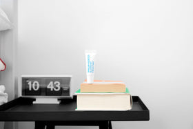 MALIN+GOETZ application on lips in lifestyle setting for long-lasting comfort benefit
