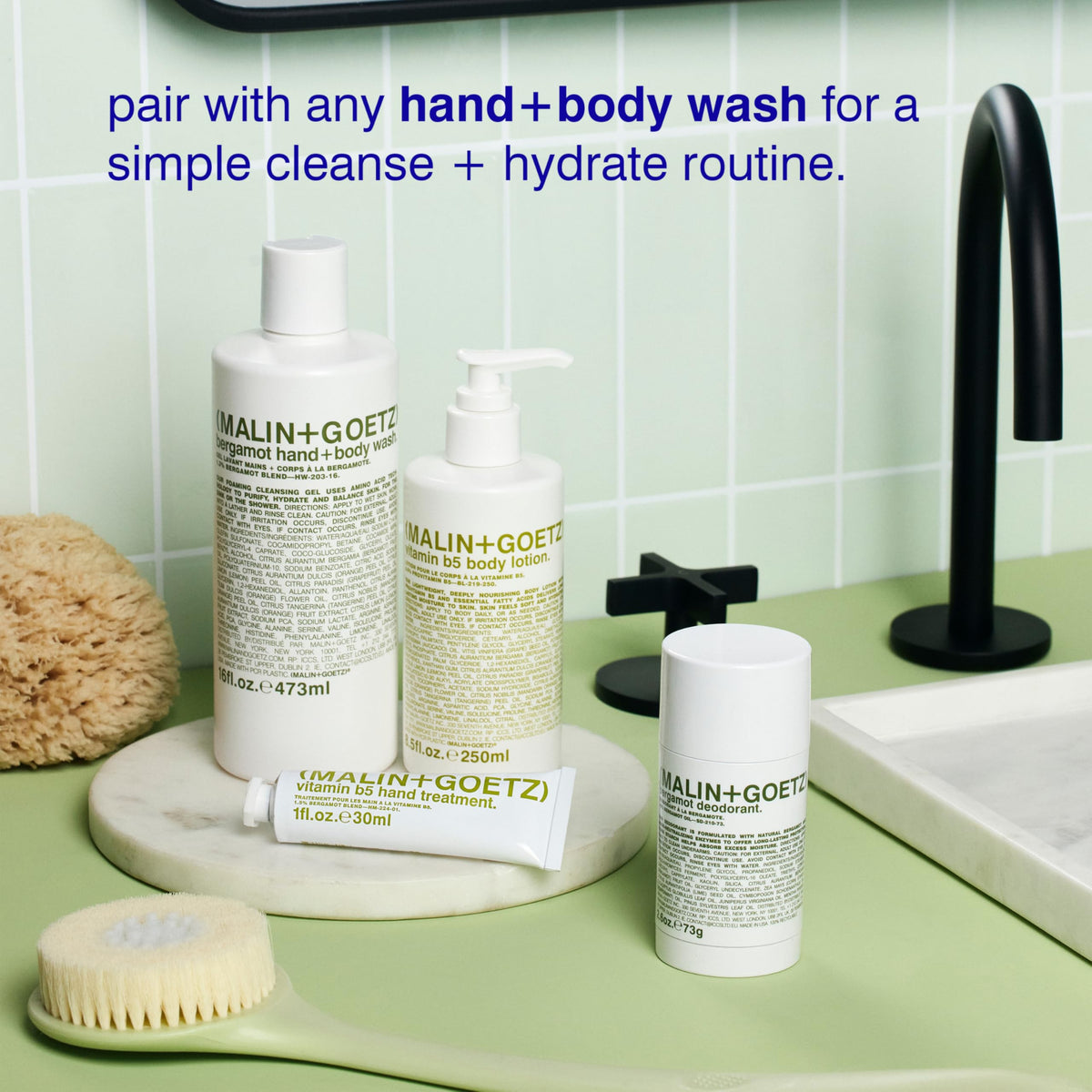 MALIN+GOETZ lotion on bathroom counter in lifestyle scene suggesting daily ritual and subtle bergamot scent