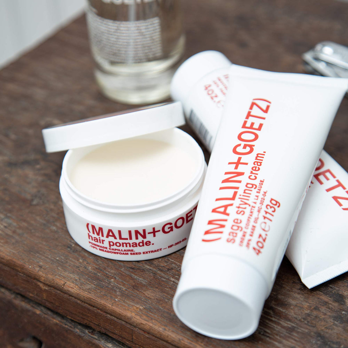 MALIN+GOETZ pomade on bathroom shelf illustrating daily routine