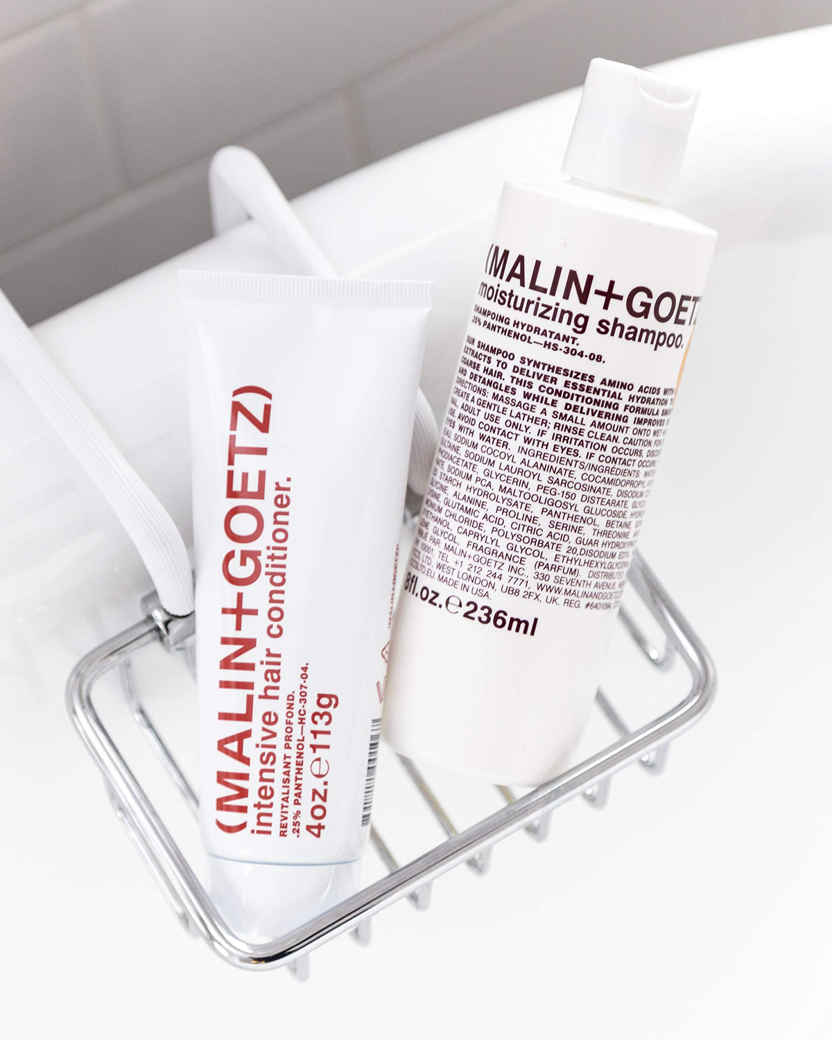 MALIN+GOETZ bottle beside conditioner in bathroom setting for a balanced routine