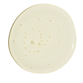 MALIN+GOETZ bottle in shower setting illustrating foaming bath and fresh scent